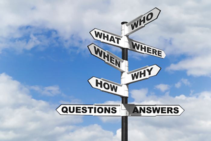 an image of a bunch of white street signs pointing in different directions with black words that say who, what, when, where, why, how, questions and answers